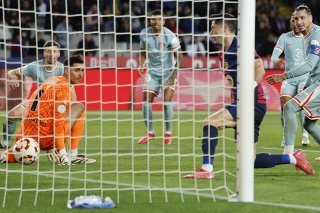 Lewandowski signe le 4-2, mais l'Atlético reviendra à 4-4 KEYSTONE/AP/Joan Monfort